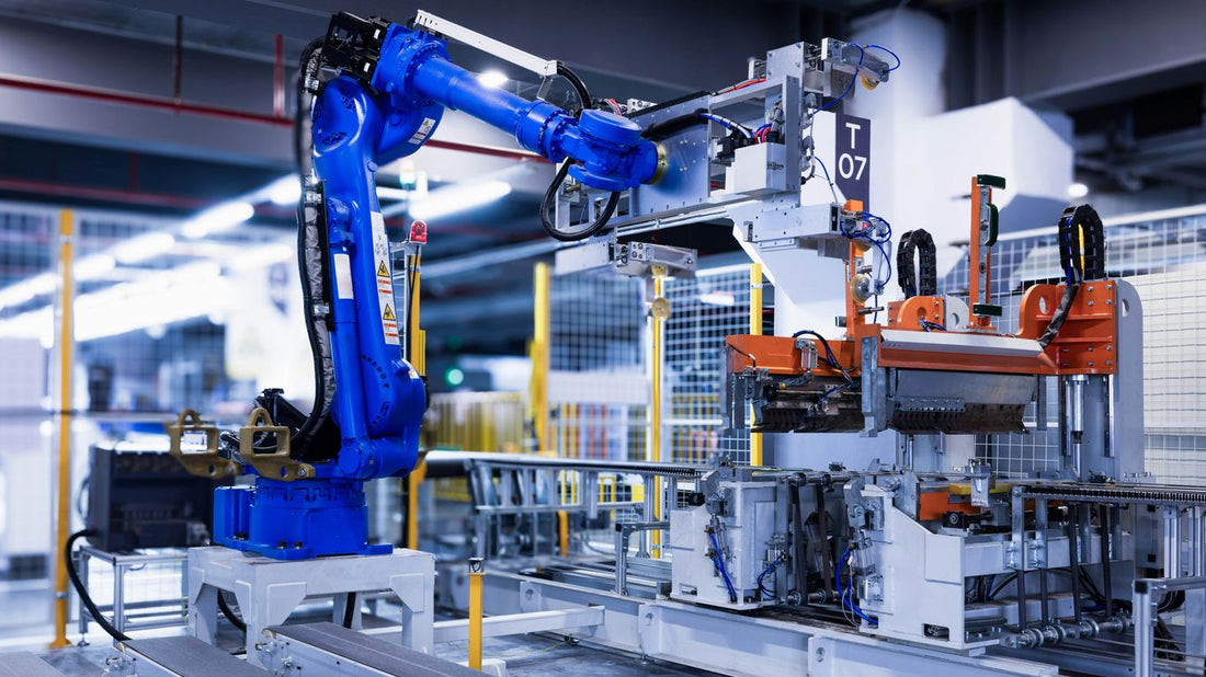 blue industrial robot arm in factory